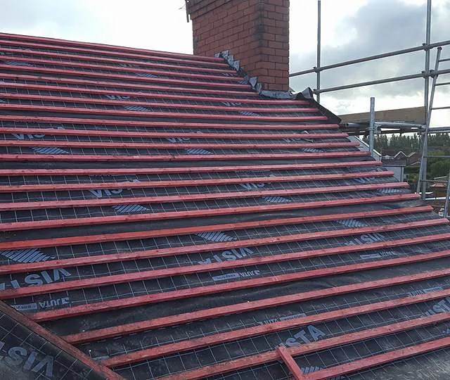 Progress of a re-roofing task being carried our by our staff