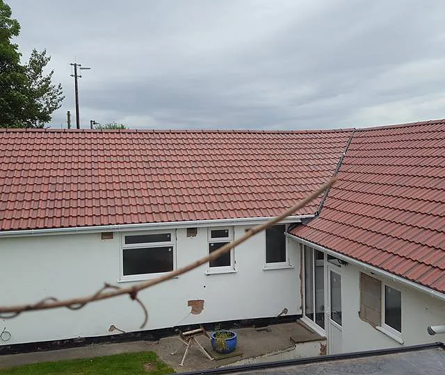 A new roof that has been installed by our team on a long home